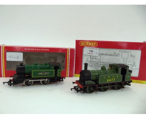 A Hornby R2164B Class J83 0-6-0 tank engine, LNER green 8477; and a R386 0-4-0 tank engine, "King George V", both with instru