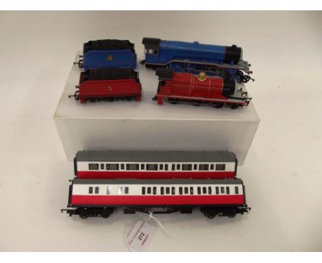 Hornby Thomas Tank items, 4-6-2 engine and tender No.4 blue; 0-6-0 engine and tender No.5 red and 2 red/white coaches, (N.M.)