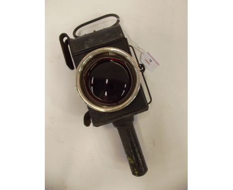 An old painted tin and brass rear carriage light