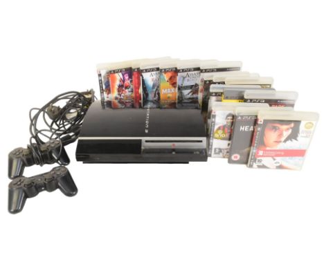 Gaming - an original Sony PS3 Playstation 3 video game console, x2 controllers and a selection of games to include; Red Dead 