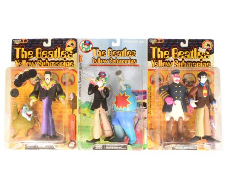 The Beatles - x3 original Mcfarlane Toys Yellow Submarine boxed figures comprising John with Jeremy, Paul with Sucking Monste
