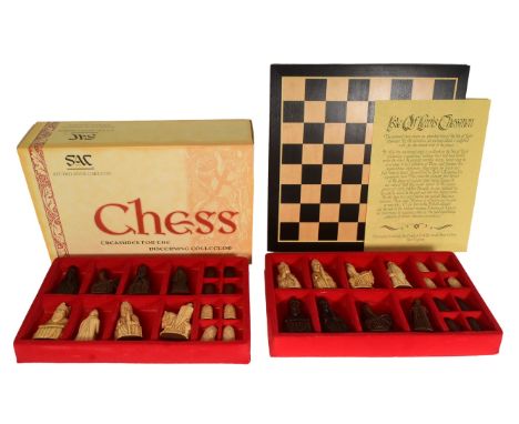 A boxed Studio Anne Carlton SAC ' Isle of Lewis ' reproduction chess set with board, Made in England. Housed in original box 