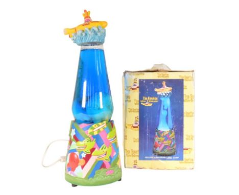 The Beatles - A 1999 Vandor made Yellow Submarine Lava Lamp. Featuring elements from the Yellow Submarine animated film, with