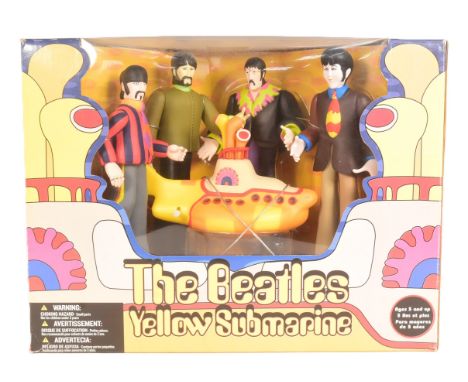 The Beatles - Yellow Submarine - a 2004 McFarlane Toys made action figure set, featuring all four Beatles and a clockwork Yel