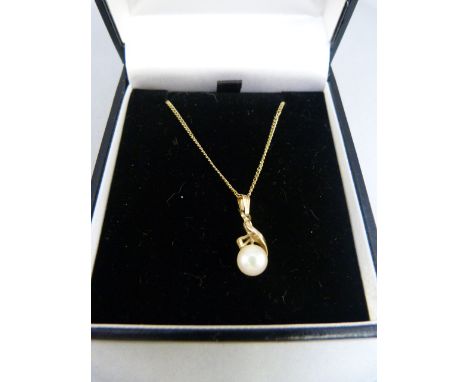 Boxed 14K yellow gold 6.7mm cultured pearl pendant and a 14K chain (20" long) Gross weight 2.7g 