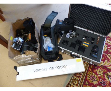 Olympus OM10 SLR camera in aluminium case with various lenses and tripod, camera cases and instruction book plus a Praktica c