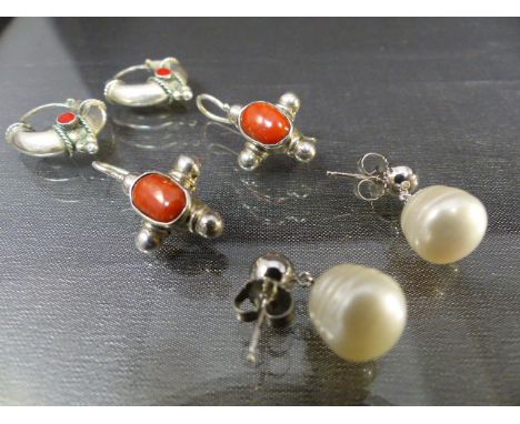 Three pairs of earrings - Two pairs of Celtic style earrings one pair set with fire coral, and the other small enamel red cir