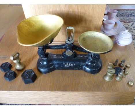 Vintage weighing scales with weights