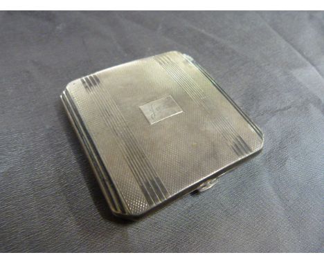 Hallmarked silver square compact Birmingham 1939 by John Rose. Engine Turned decoration to front with plaque bearing the word