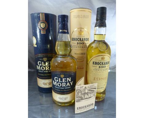 A Knockando 12 year Single Malt Scotch Whisky distilled in 1986 and bottle in 1998 in original presentation tube and with pre