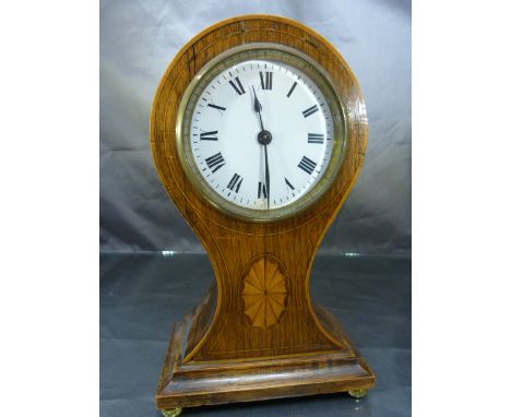 A small Edwardian mahogany cased Mantle Clock with white enamel circular dial, French movement by R & Co,  the case with sati