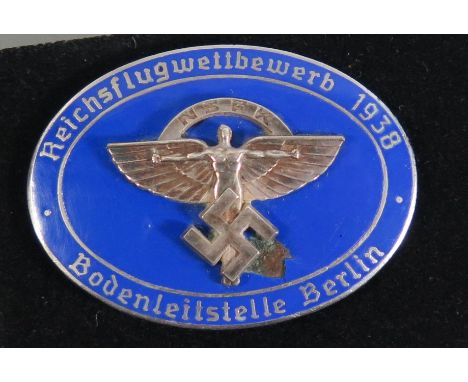 From the Charles Hume-Smith Collection: A WWII Nazi German NSFK Participant Enamel Badge, maker Rob. Neff Berlin W57 