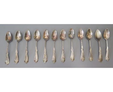 A Set of Twelve .80 Continental Silver Coffee Spoons with bright cut decoration, 56g 