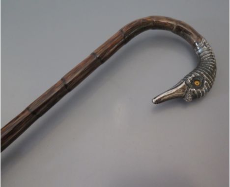 An Edward VII Silver Mounted Parasol with the handle modelled as a swan's head with glass eyes, London 1901, Julius Klinkhard