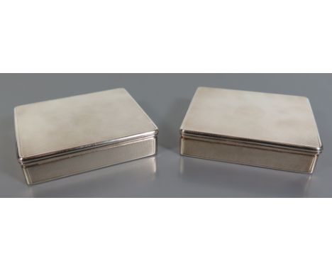 A Pair of Elizabeth II Britannia Standard Silver Hinged Boxes with engine turned decoration, London 1953m Garrard & Co., 273g