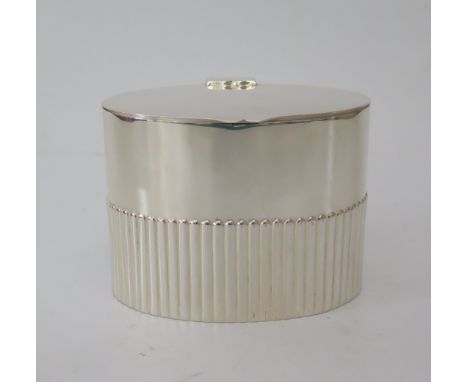 A Victorian Silver Tea Caddy of oval form with fluting, London 1892, William Hutton & Sons, 233g 