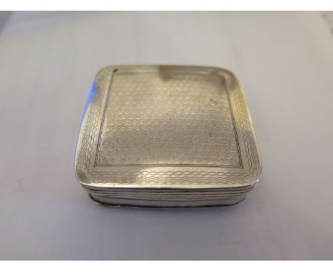 An Early 19th Century Continental Silver Snuff Box, engraved with a waved line pattern, hallmarked on the inside lid and base