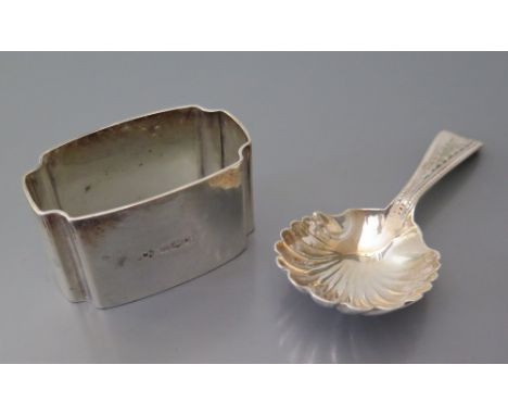 A Victorian Silver Caddy Spoon with scallop bowl Exeter 1875, Josiah Williams & Co. AND Sheffield silver napkin ring, 57g 