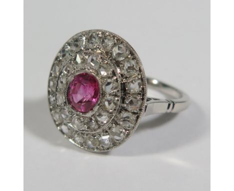 A Ruby and Rose Cut Diamond Cluster Ring in a precious white metal setting, 20 x 17mm spread, size M.5, 6g 