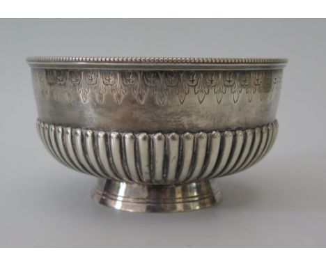 A Victorian Silver Sugar Bowl with fluted and foliate chased decoration, London 1882, William Evans, 171g, 12cm diam. 