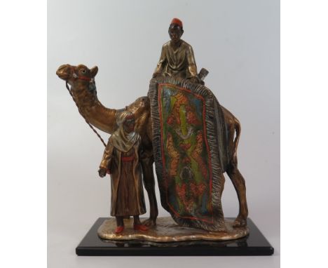 The Carpet Seller _ A Cold Painted Figural Table Lighter, 19 cm high 