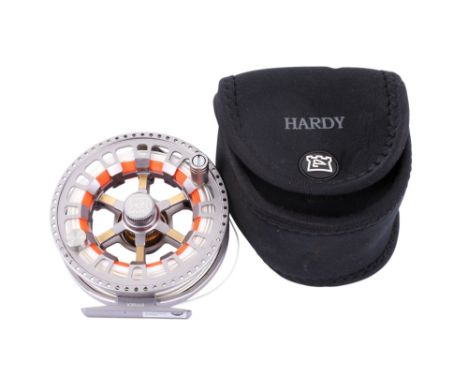 A Hardy Ultra Light 6000 CA DD fishing reel. In a Hardy pouch. Diameter 10cm. 