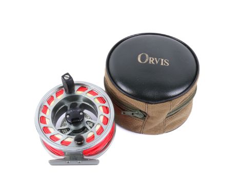 An Orvis MACH IV fishing reel. In original padded pouch. Diameter 10cm.
