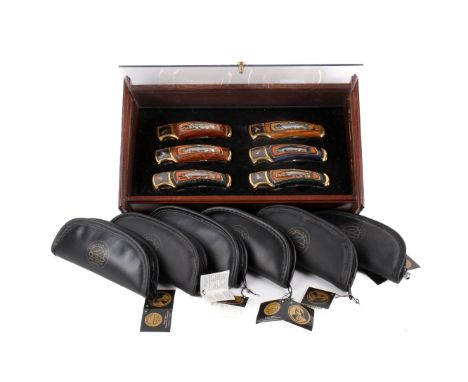 Six Franklin Mint 'Trout Collector' penknives in a custom display case. Each knife in a zipped pouch and with the certificate