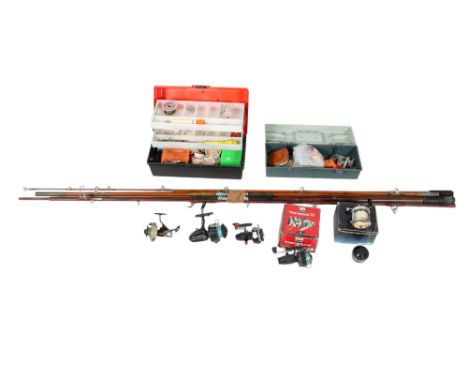 Two fishing rods and assorted equipment. Including a 'Sea Spray' rod, a boxed International 30 reel, Mitchell 624 boat reel, 