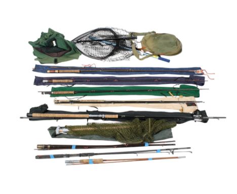 An assortment of fishing equipment. Including nets, fly fishing rods, canvas bags, etc.  Condition Report: The rod with the c