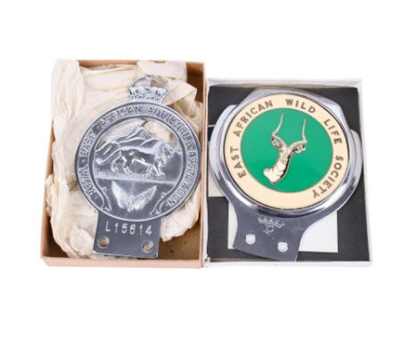 Two vintage car badges. Comprising a Royal East African Automobile Association, L156614 and an East African Wild Life Society