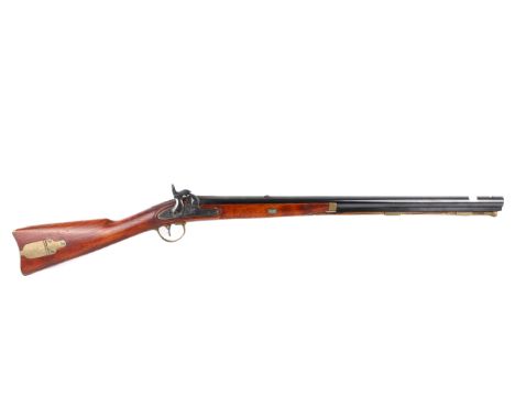 A 204 20 gauge muzzle loading musket. Fore sight missing. loading and patch box in stock, s/n. 20802. SECTION-2 LICENSE IS RE