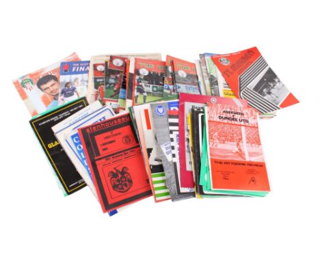 A collection of vintage Scottish football programmes. Including 1999 Scotland vs England, 1987 Celtic vs Rangers, 1983 St. Mi