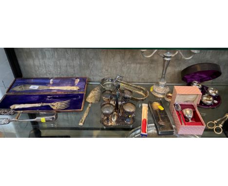 A collection of silver plate including a cased fish knife and fork, two sets of plated salts, a set of four egg cups on a sta