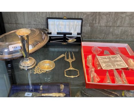 A collection of silver plate including a lidded entree dish, a specimen vase, a cased fork and spoon and a bread fork 