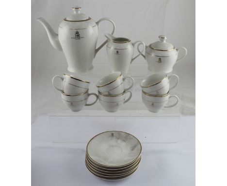 An Elizabeth II Queen's Golden Jubilee six-setting tea set celebrating fifty years in 2002, comprising cups, saucers, milk ju