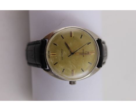 Omega; a tonneau form stainless steel manual wind wristwatch, gilt dial set with baton numerals. CONDITION REPORT Crown wind 