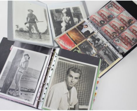A collection of 10 x 8 black and white film star portrait photographs and advertising booklets for vintage films, film report