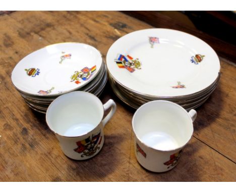 A quantity of WWI commemorative plates, cups and saucers.