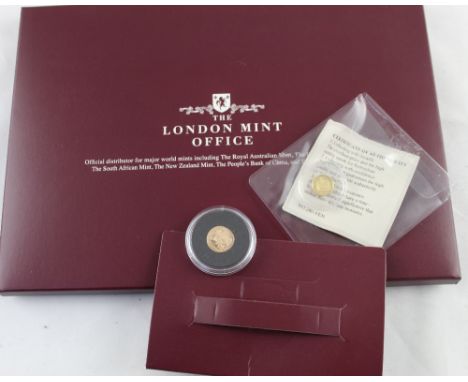 An Elizabeth II 22ct quarter sovereign coin bearing George and the Dragon to the revers, approx 2g, with certificate and fold