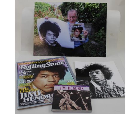 A Harry Goodwin black and white 10 x 8ins photograph of Jimi Hendrix, with Harry Goodwin Studios sticker verso, a copy of the