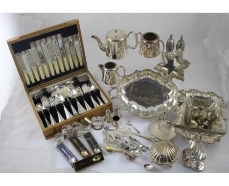 An Art Deco oak six-setting canteen of plated cutlery, a quantity of plated ware to include a three-piece tea service and six