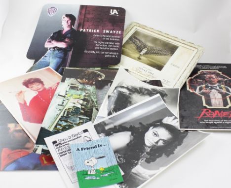 A small collection of vintage film advertising to include card display board for Patrick Swayze's 'Road House', a card poster