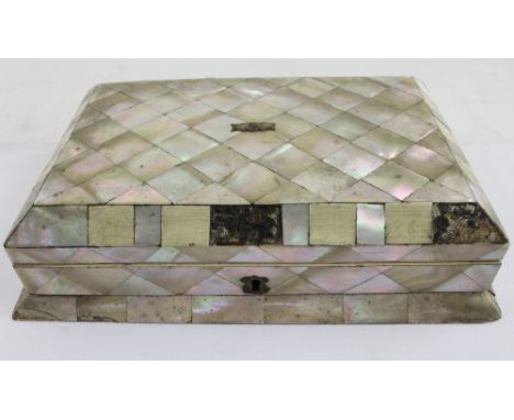 An early 20th century mother of pearl games compendium with fitted blue silk interior and cribbage board, c1915, width 26cm.