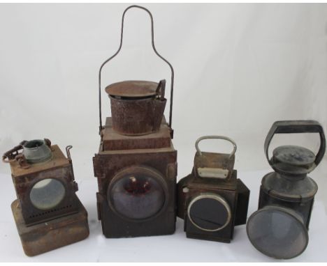 A collection of vintage railway mans lamps to include a black British Rail signal mans lamp with changeable filters, a paraff