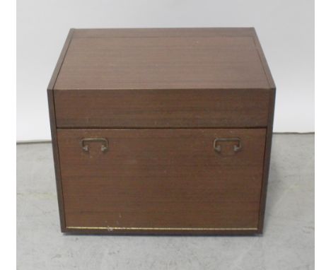 A mid/late 20th century sapele mahogany folding drinks cabinet opening to reveal a mirrored shelf and back, width 61cm.