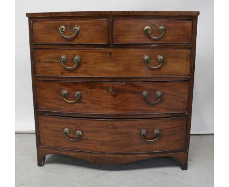 A George III mahogany bowfront chest of two-over-three drawers, on splay bracket feet, width 87.5cm. CONDITION REPORT Patch t