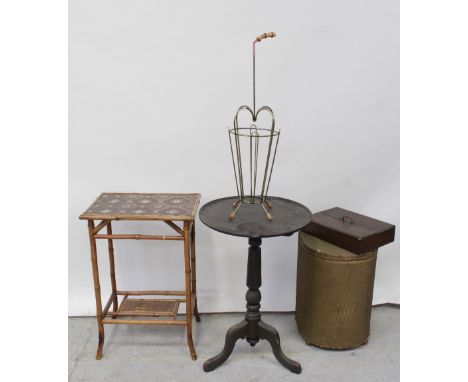 An Edwardian bamboo side table, a Lloyd Loom style linen basket, an oak cutlery box and a vintage metal umbrella stand in the