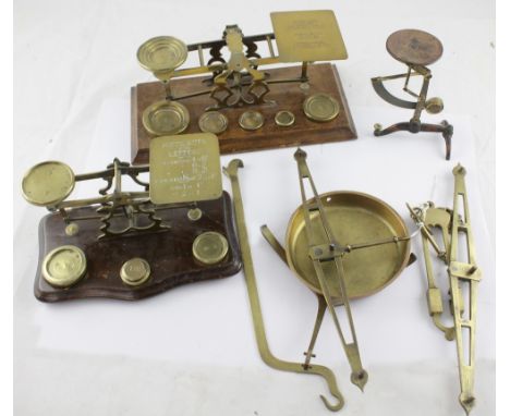 Three late 19th/early 20th century letter scales, one marked 'British Empire', one on freestanding tripartite base marked 'De