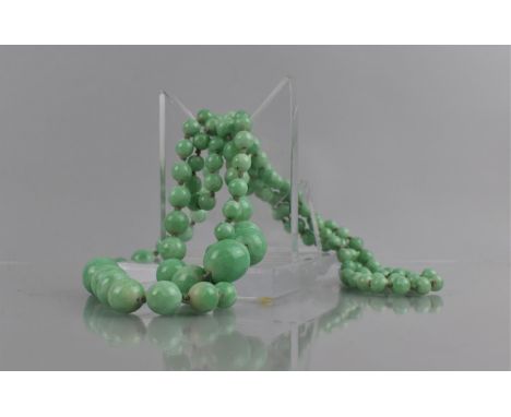 A Double String of Early 20th Century Faux Applegreen Jade Graduated Ovoid Beads, Longest Length 87cms and Largest Bead Appro